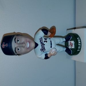 Nolan Ryan Bobblehead and Baseball Card Collection.